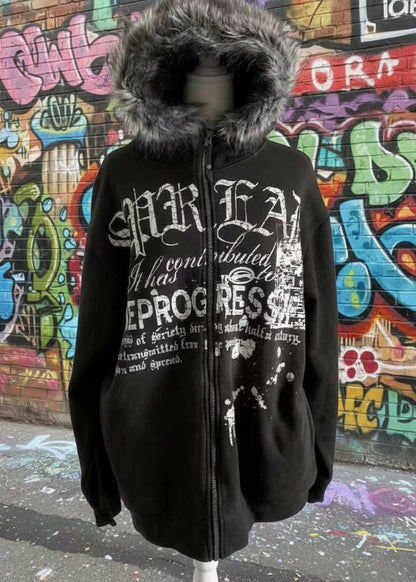 Black hoodie with text design on a mannequin against a light background